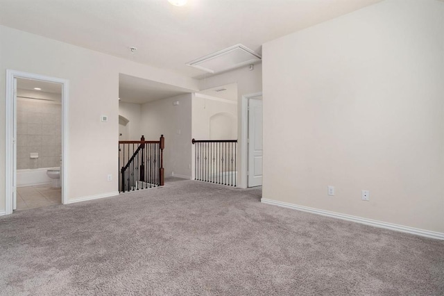 24727 Lake Basin Ct, Katy, TX 77493 - carpeted empty room featuring attic access and baseboards