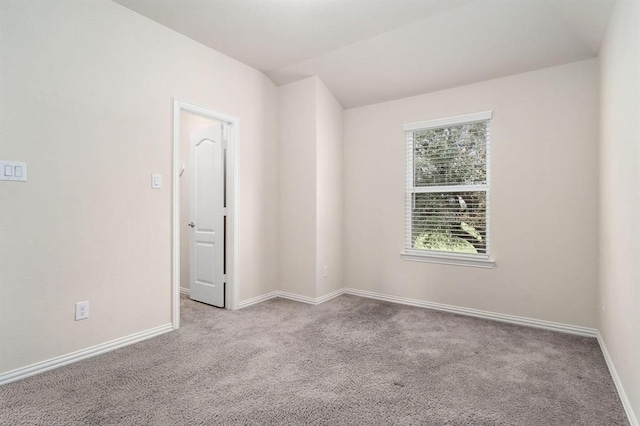 24727 Lake Basin Ct, Katy, TX 77493 - carpeted empty room featuring baseboards and lofted ceiling