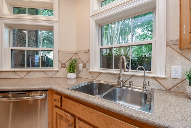 3003 Bernadette Ln, Houston, TX 77043 - kitchen with dishwasher, light countertops, healthy amount of natural light, and tasteful backsplash
