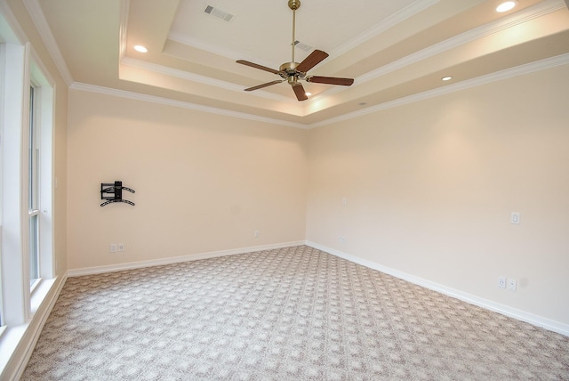 3003 Bernadette Ln, Houston, TX 77043 - carpeted empty room with a raised ceiling, a ceiling fan, ornamental molding, and recessed lighting