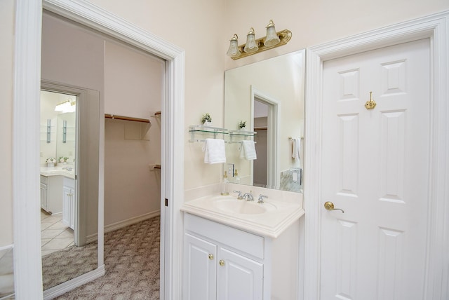 3003 Bernadette Ln, Houston, TX 77043 - bathroom with vanity and baseboards