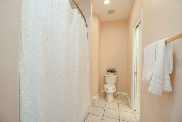 3003 Bernadette Ln, Houston, TX 77043 - full bathroom featuring toilet and tile patterned floors