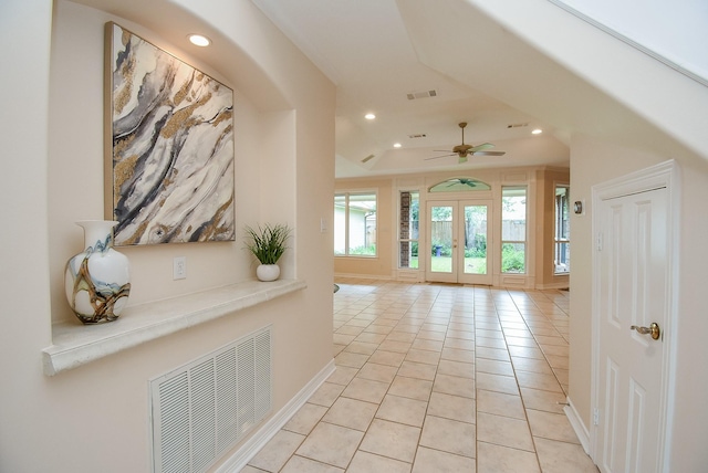 3003 Bernadette Ln, Houston, TX 77043 - hall with recessed lighting, light tile patterned floors, and a tray ceiling