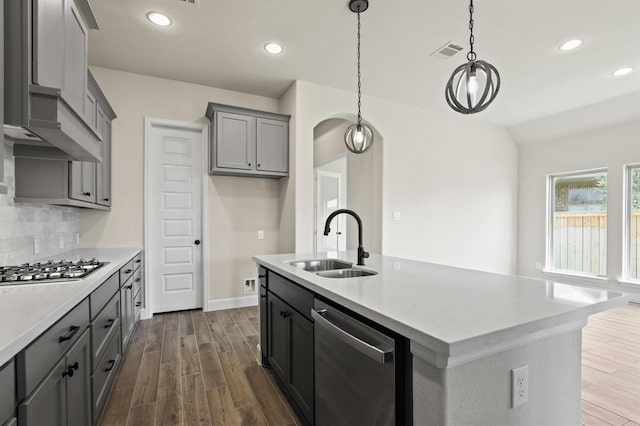 18511 Wolf Mountain Ln, Cypress, TX 77433 - kitchen with stainless steel appliances, dark wood-type flooring, gray cabinetry, light countertops, and recessed lighting