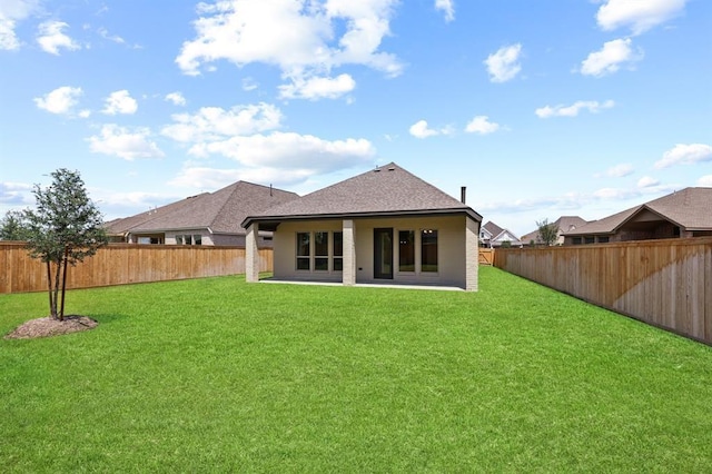 18511 Wolf Mountain Ln, Cypress, TX 77433 - back of house with a fenced backyard and a shingled roof
