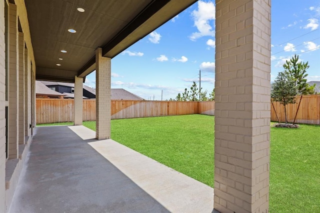 18511 Wolf Mountain Ln, Cypress, TX 77433 - fenced backyard featuring a patio area
