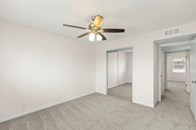 8101 Amelia Rd Unit 509, Houston, TX 77055 - unfurnished bedroom with carpet floors, a closet, and a ceiling fan