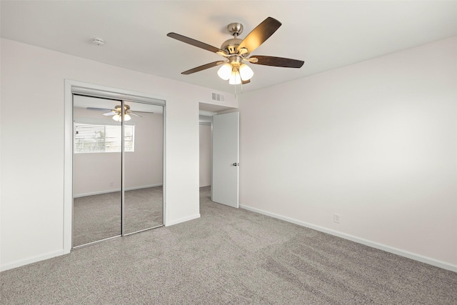 8101 Amelia Rd Unit 509, Houston, TX 77055 - unfurnished bedroom with carpet floors, a closet, and a ceiling fan