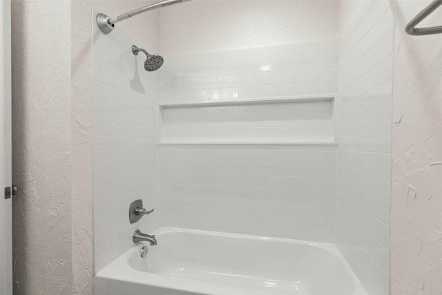 8101 Amelia Rd Unit 509, Houston, TX 77055 - full bathroom featuring shower / washtub combination and a textured wall