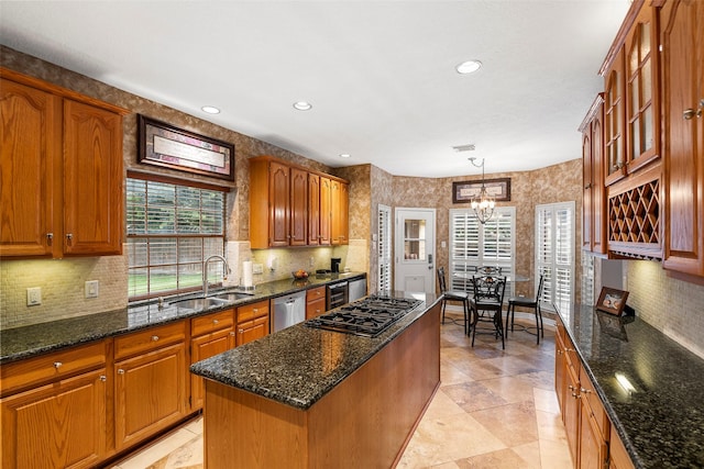 8511 Parmer Ct, Houston, TX 77064 - kitchen with dishwasher, black gas cooktop, a chandelier, decorative backsplash, and recessed lighting
