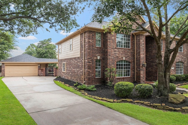 8511 Parmer Ct, Houston, TX 77064 - traditional-style house with concrete driveway, brick siding, and an attached garage