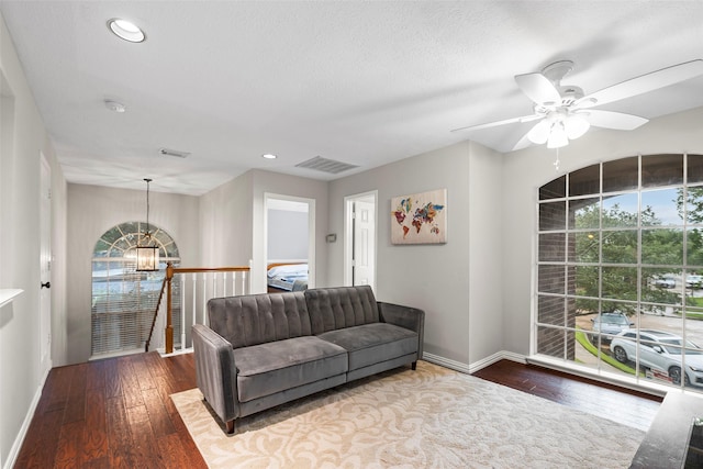 8511 Parmer Ct, Houston, TX 77064 - living area featuring wood-type flooring, ceiling fan, recessed lighting, and a chandelier