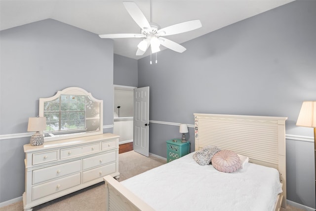 8511 Parmer Ct, Houston, TX 77064 - bedroom with vaulted ceiling, light colored carpet, and a ceiling fan