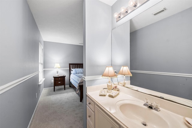 8511 Parmer Ct, Houston, TX 77064 - ensuite bathroom with vanity and baseboards