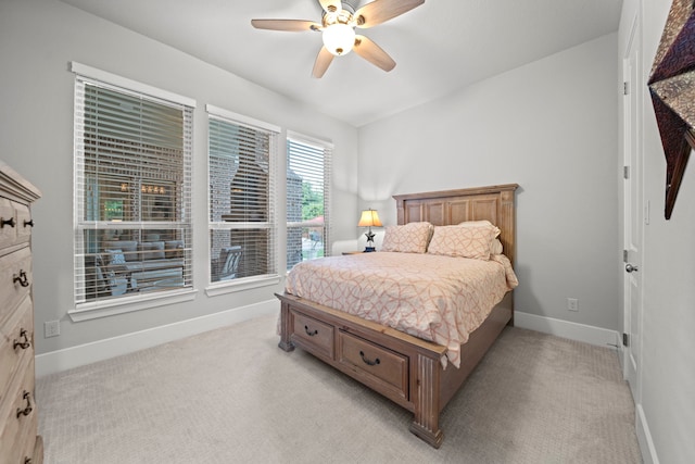 30 Madrone Terrace Pl, Tomball, TX 77375 - bedroom with light carpet and ceiling fan