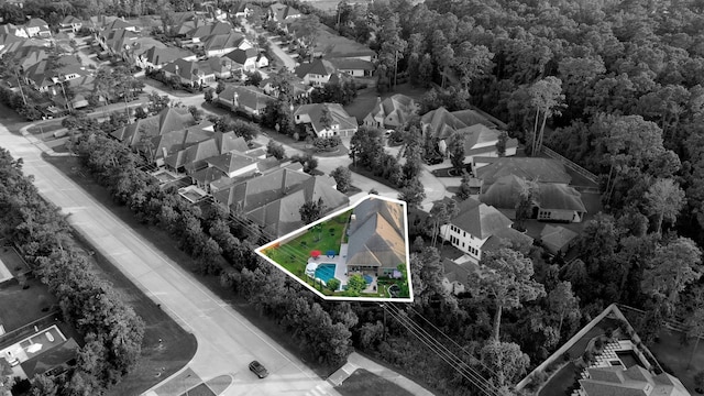 30 Madrone Terrace Pl, Tomball, TX 77375 - aerial perspective of suburban area with a heavily wooded area and property parcel outlined