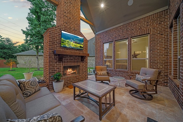 30 Madrone Terrace Pl, Tomball, TX 77375 - view of patio with an outdoor living space with a fireplace