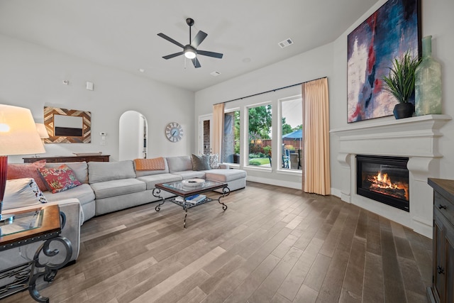 30 Madrone Terrace Pl, Tomball, TX 77375 - living room with a ceiling fan, wood finished floors, and a glass covered fireplace