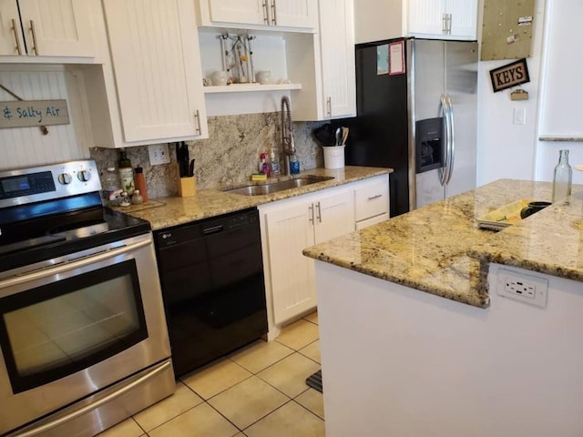 23002 Vida, Galveston, TX 77554 - kitchen with stainless steel appliances, open shelves, light tile patterned flooring, and white cabinets
