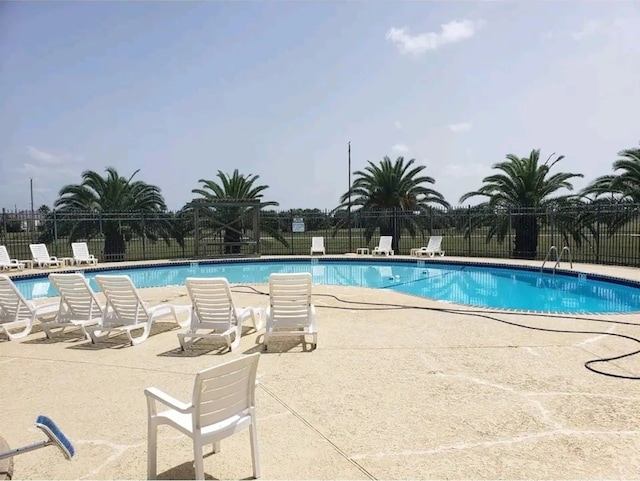 23002 Vida, Galveston, TX 77554 - community pool with a patio