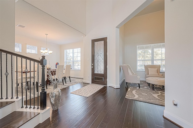 47 Monarch Trl, Sugar Land, TX 77498 - entryway with a chandelier, wood finished floors, and stairs