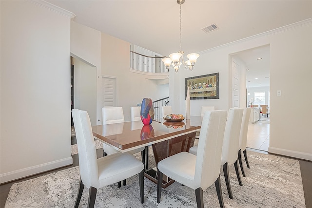 47 Monarch Trl, Sugar Land, TX 77498 - dining space featuring a chandelier and crown molding