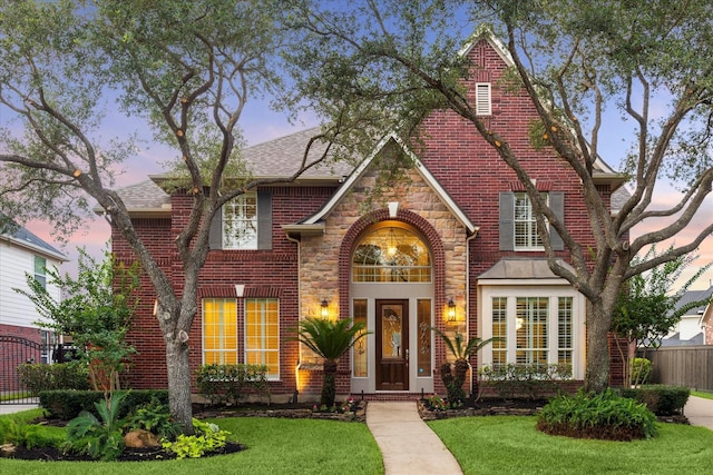 12410 Sonata Canyon Ln, Houston, TX 77041 - tudor home with stone siding and brick siding