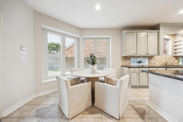 12410 Sonata Canyon Ln, Houston, TX 77041 - dining space featuring baseboards and recessed lighting