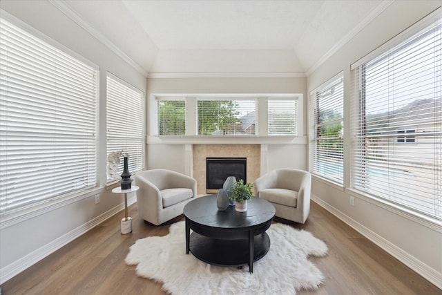 12410 Sonata Canyon Ln, Houston, TX 77041 - sitting room featuring wood finished floors and a tiled fireplace