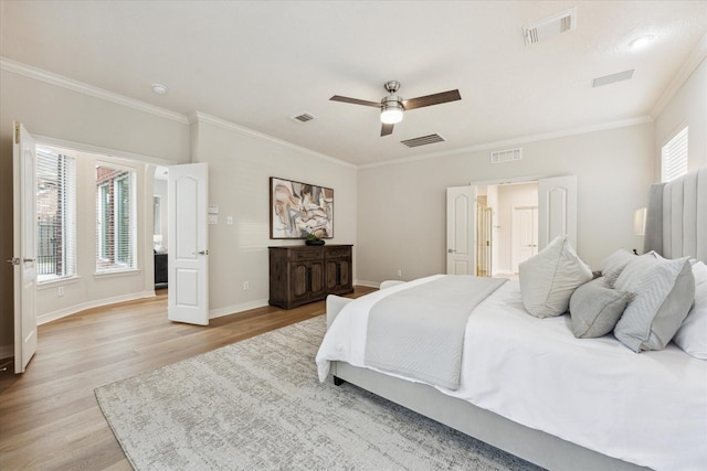 12410 Sonata Canyon Ln, Houston, TX 77041 - bedroom featuring wood finished floors, crown molding, and a ceiling fan