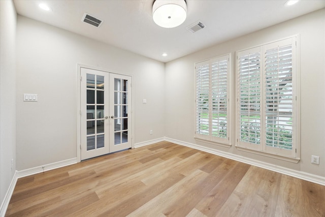 12410 Sonata Canyon Ln, Houston, TX 77041 - unfurnished room with french doors, wood finished floors, and recessed lighting