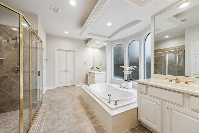 12410 Sonata Canyon Ln, Houston, TX 77041 - full bathroom with a stall shower, two vanities, recessed lighting, and a bath