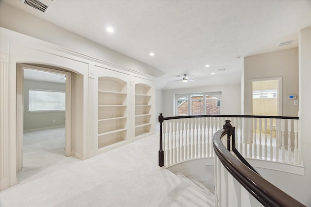 12410 Sonata Canyon Ln, Houston, TX 77041 - corridor featuring an upstairs landing, light colored carpet, recessed lighting, and built in shelves
