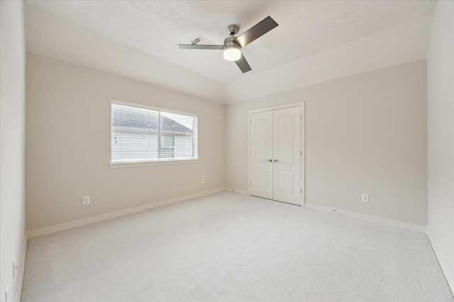12410 Sonata Canyon Ln, Houston, TX 77041 - unfurnished bedroom featuring light carpet, a closet, and ceiling fan