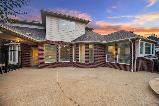 12410 Sonata Canyon Ln, Houston, TX 77041 - rear view of property with brick siding, a patio area, and a shingled roof