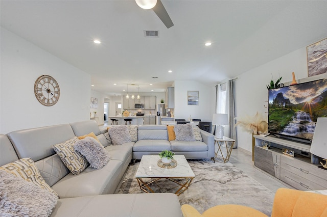 29918 Reagans Ranch Dr, Katy, TX 77494 - living area with recessed lighting, ceiling fan, and a chandelier