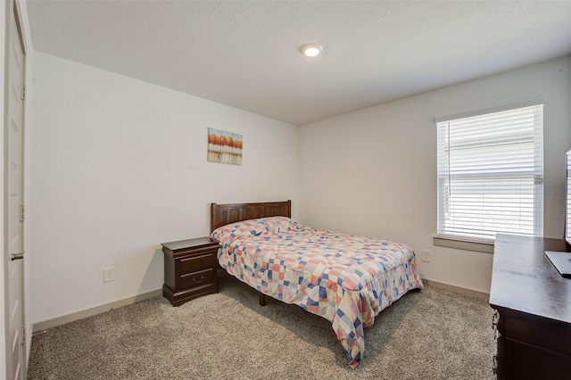 29918 Reagans Ranch Dr, Katy, TX 77494 - carpeted bedroom featuring baseboards