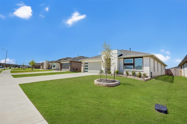 29918 Reagans Ranch Dr, Katy, TX 77494 - view of front facade with driveway, a garage, roof with shingles, and brick siding