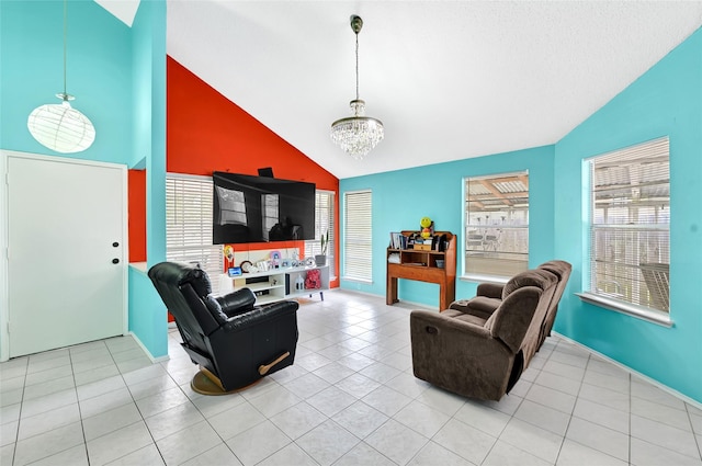15811 Beechnut St, Houston, TX 77083 - living room featuring high vaulted ceiling, a chandelier, and light tile patterned floors