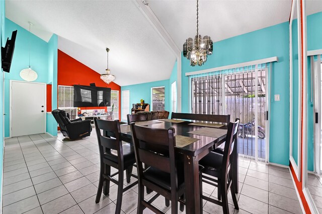 15811 Beechnut St, Houston, TX 77083 - tiled dining area featuring high vaulted ceiling and a chandelier