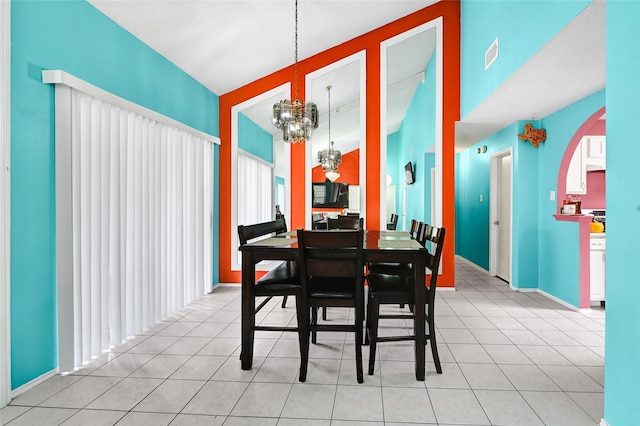 15811 Beechnut St, Houston, TX 77083 - dining room with a chandelier and light tile patterned floors