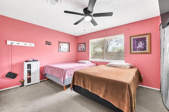 15811 Beechnut St, Houston, TX 77083 - carpeted bedroom featuring a textured ceiling and ceiling fan