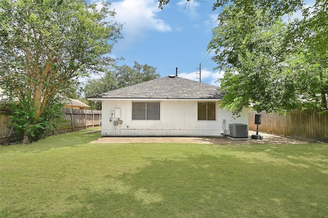 15811 Beechnut St, Houston, TX 77083 - rear view of property with a shingled roof and a fenced backyard