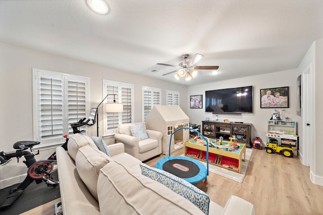 2707 Wollemi Pine Trl, Katy, TX 77493 - living room with wood finished floors and ceiling fan