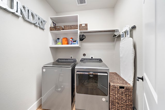 2707 Wollemi Pine Trl, Katy, TX 77493 - laundry area featuring independent washer and dryer and baseboards