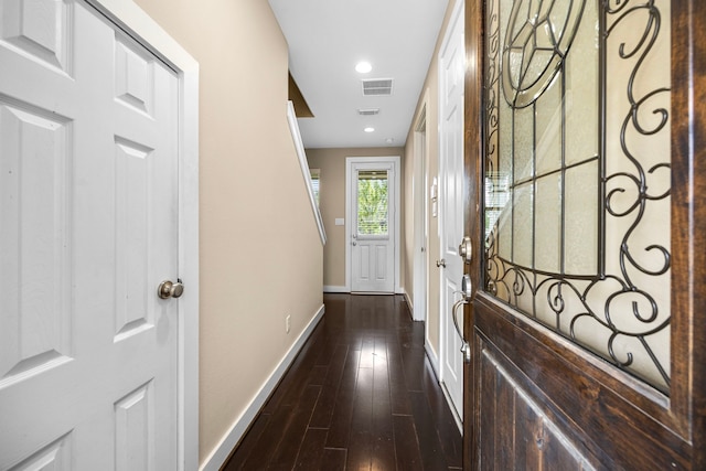 1161 Beasley Hills Ln, Houston, TX 77008 - entryway featuring baseboards and dark wood finished floors