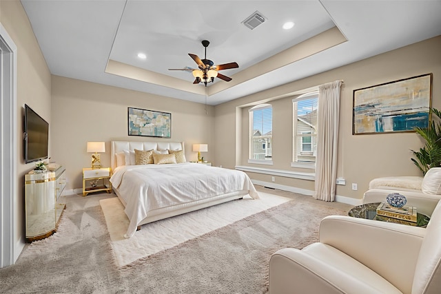 1161 Beasley Hills Ln, Houston, TX 77008 - bedroom featuring carpet, a tray ceiling, recessed lighting, and ceiling fan