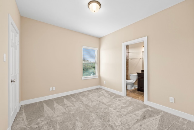 1161 Beasley Hills Ln, Houston, TX 77008 - unfurnished bedroom with carpet and connected bathroom