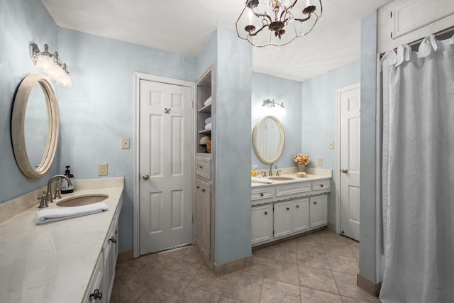 5610 Edgewick Ct, Houston, TX 77069 - full bath featuring two vanities and a chandelier