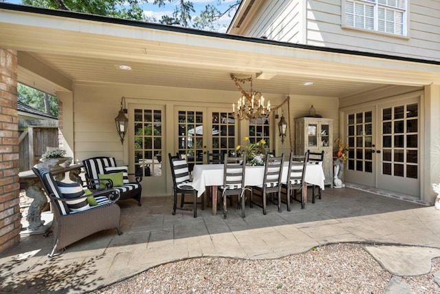 5610 Edgewick Ct, Houston, TX 77069 - view of patio featuring french doors and outdoor dining space